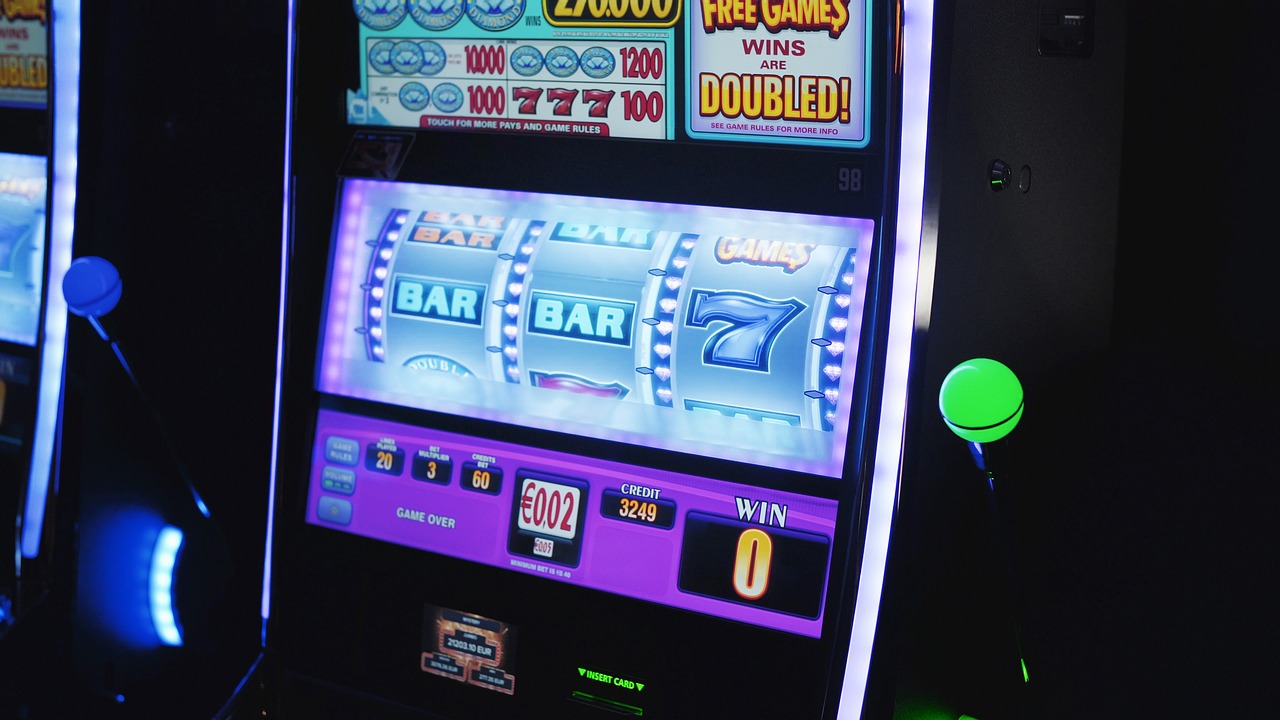 Neon-lit online slot machines and jackpot screens at Sexy Slot Asean
